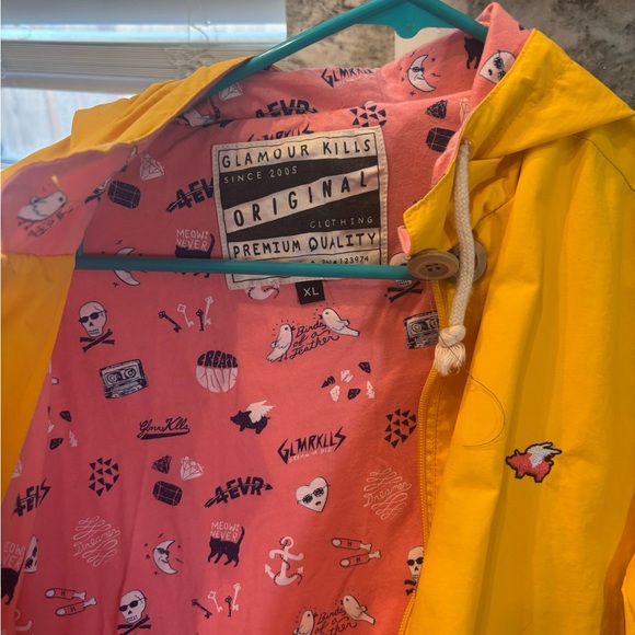 Glamour Kills Women’s Rain Jacket with Graphic Pink Lining - Picture 1 of 3